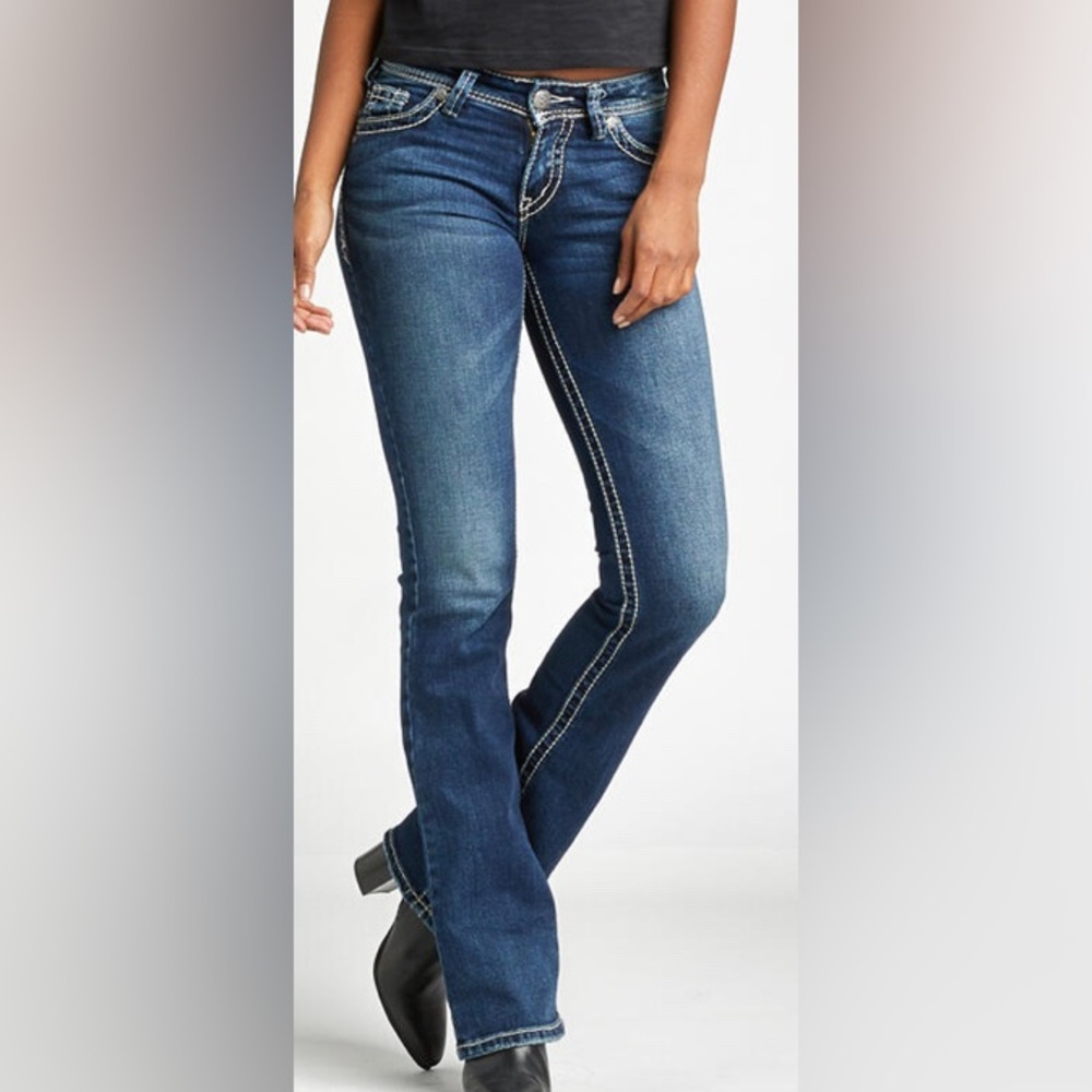 Silver bootleg blue jeans